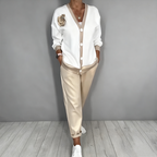 Neravine - Chic V-Neck and High Waisted Pants Set